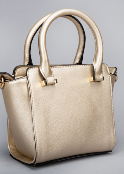 Caprisa maza rokas soma, gaiši zeltainā krāsā (BS461002S17) Caprisa maza rokas soma, gaiši zeltainā krāsā (BS461002S17)